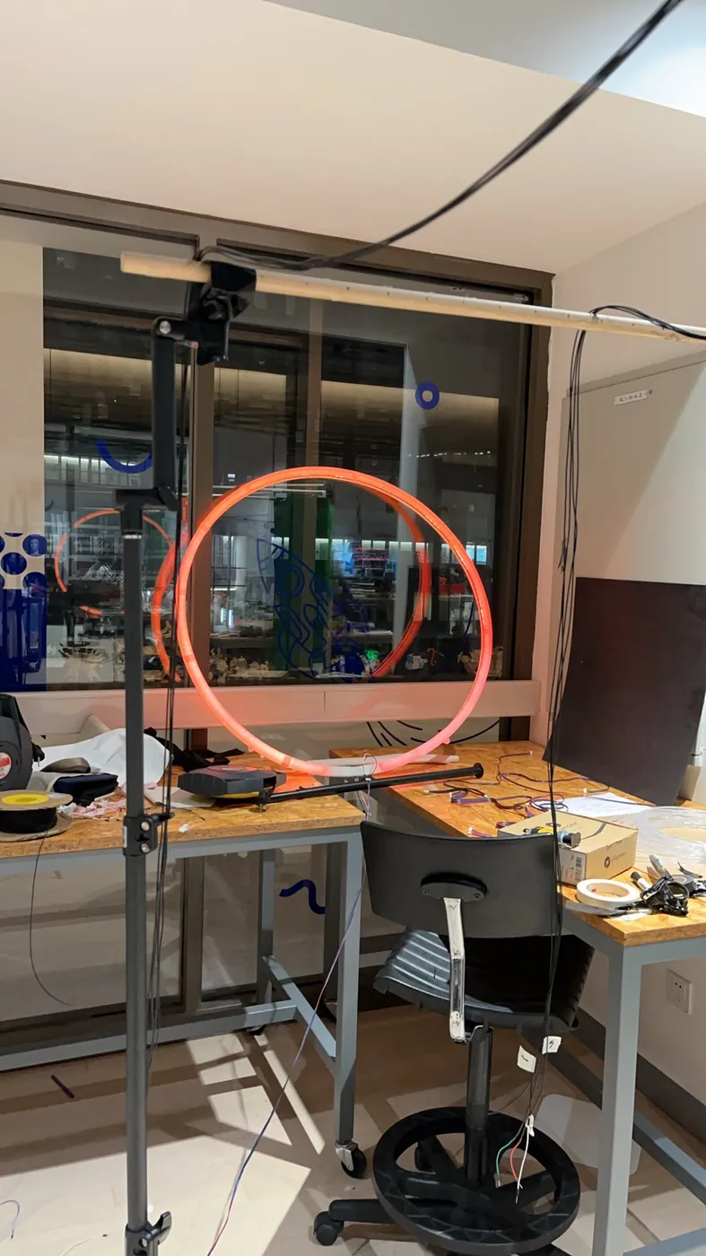 The LED ring mounted on a stand in the lab for testing